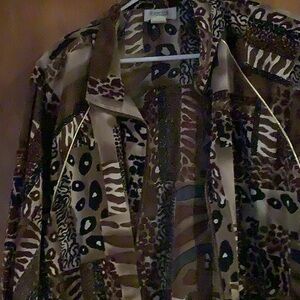 Women’s blazer jacket multicolor with black, white, brown and beige.